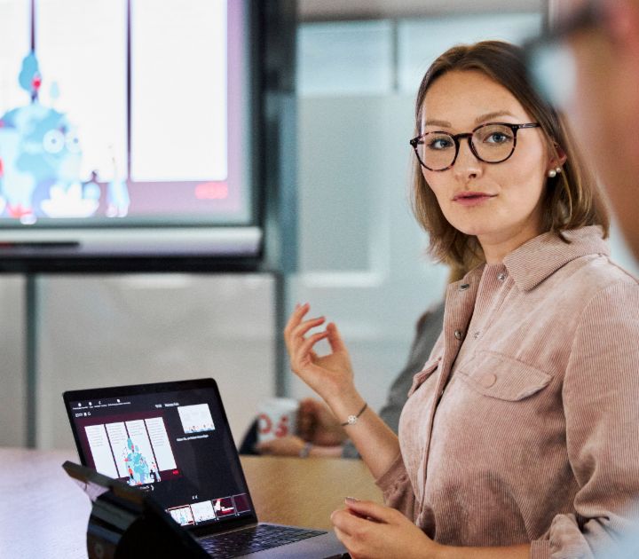 EOS employee presents a topic to customers